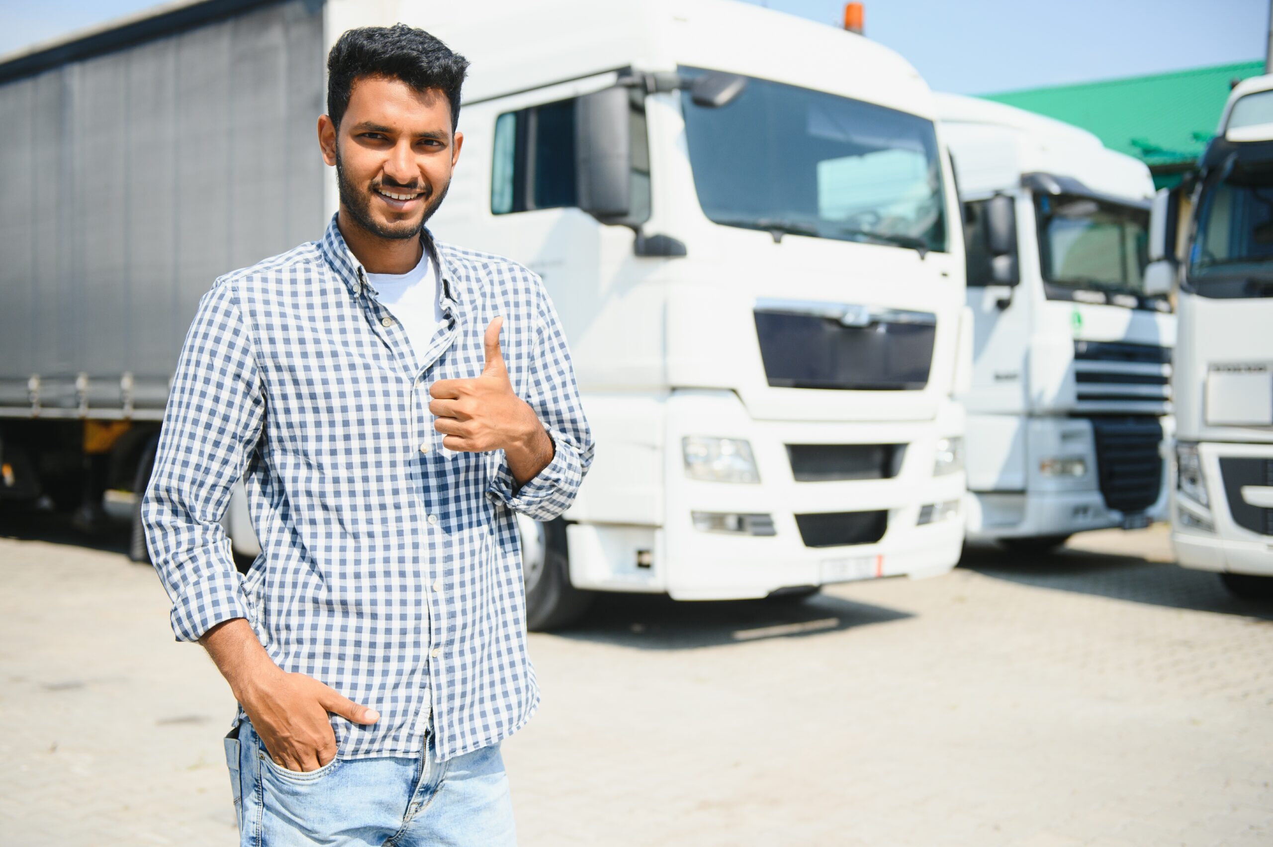 Young,Indian,Man,Standing,By,His,Truck.,The,Concept,Of
