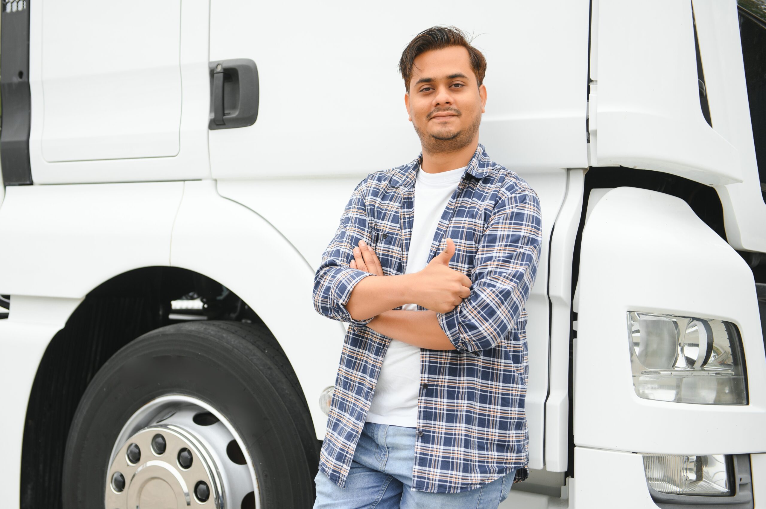 Young,Indian,Businessman,With,His,Freight,Forward,Lorry,Or,Truck